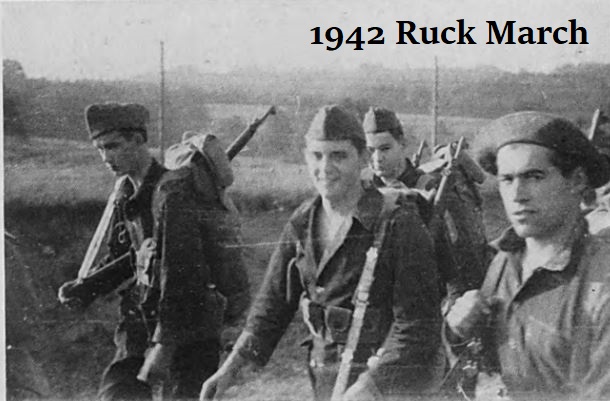 Black and white image of four cadets walking in the 1942 Ruck March.