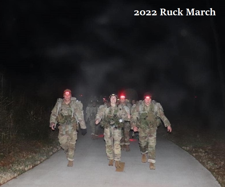 A group of cadets walking in the dark in the 2022 Ruck March.