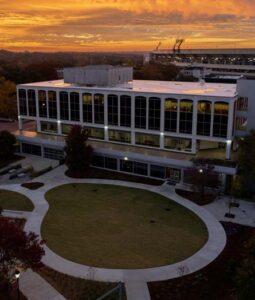 An aerial sunset view of the Grady College of Journalism and Mass Communication building