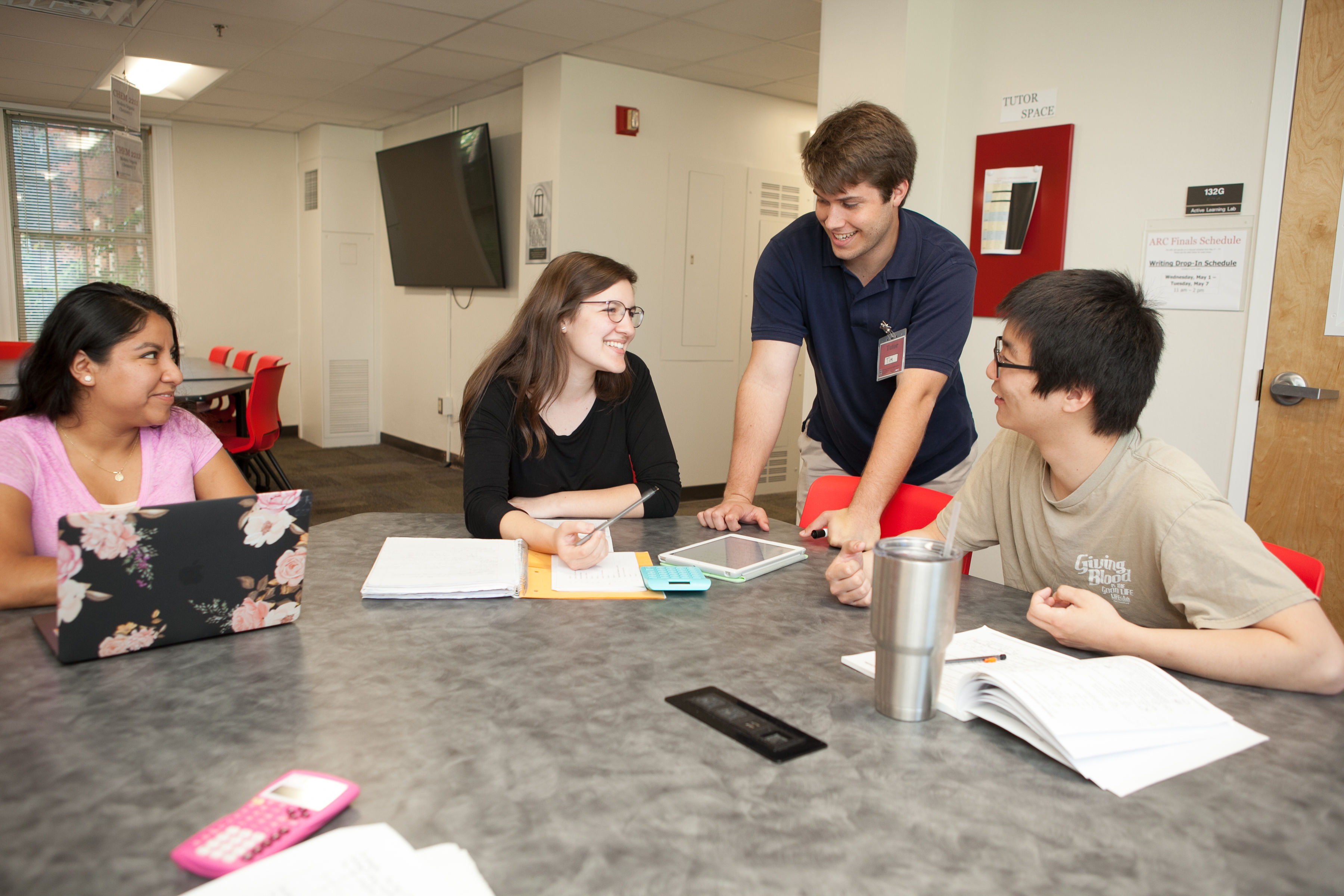 Students chat in a tutoring session